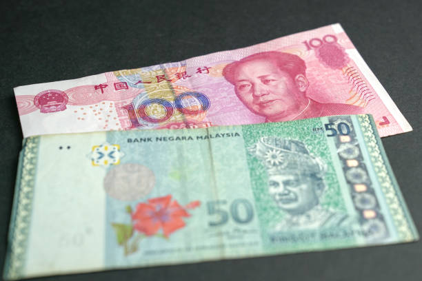 istock Hundred Chinese Yuan and Fifty Malaysia Ringgit 1197430335