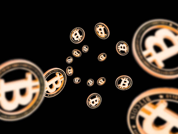 istock Bitcoin wallet. Gold Falling Cryptomoney isolated on dark. Cryptocurrency background. 1197431749