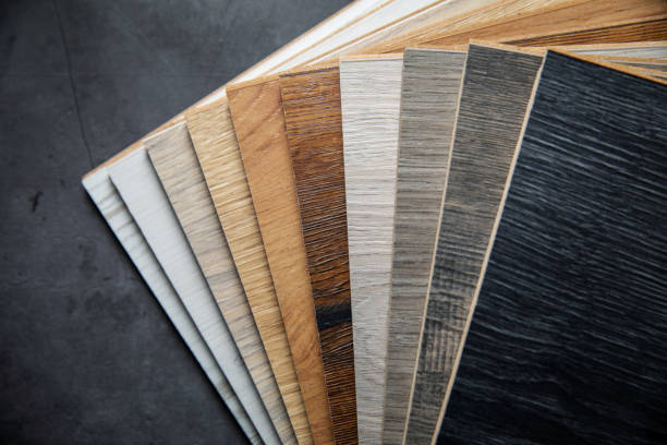 istock variety of laminate material samples on dark stone background 1197433940