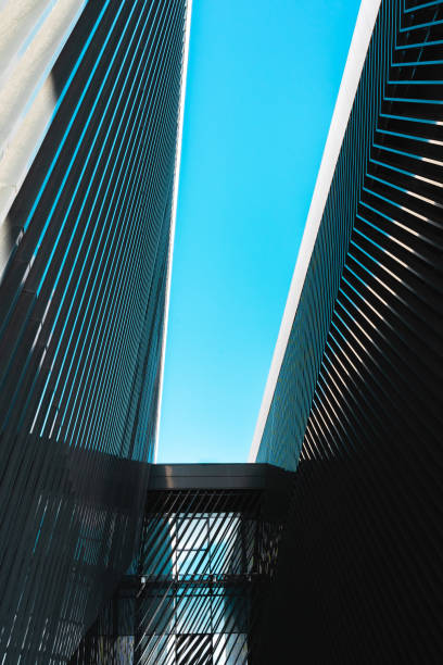 istock Two contiguous buildings of modern architecture 1197434597
