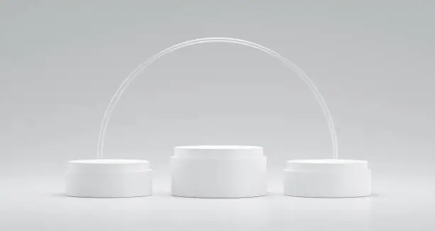 Winner podium or pedestal display on white background with circle glass ring and success concept. Blank product shelf standing backdrop. 3D rendering.