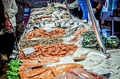 Venetian fish market. The Rialto fish market is located alongside the Grand Canal near the Rialto Bridge - Venice, Italy