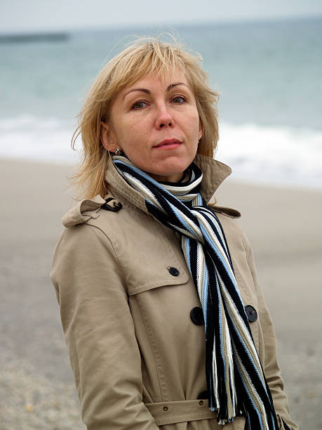 istock Woman on sea shore 119744368