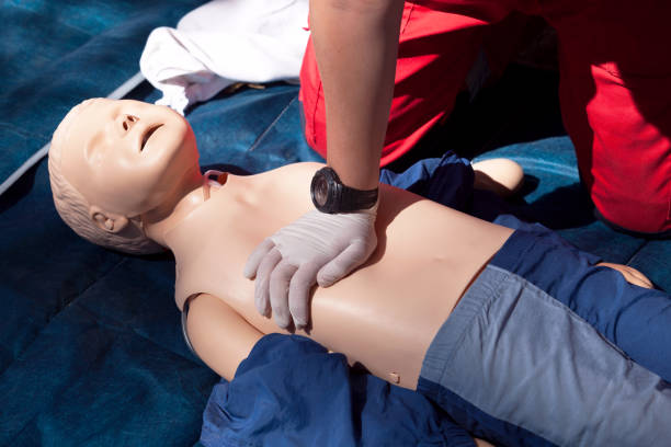CPR - Cardiopulmonary resuscitation and first aid class stock photo