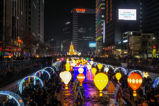 Seoul christmas festival colorful lanterns lit up at night over the Cheonggye stream. Taken on December 24th 2019. Seoul, South Korea