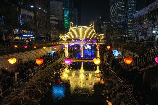 Seoul christmas festival colorful lanterns lit up at night over the Cheonggye stream. Taken on December 24th 2019. Seoul, South Korea