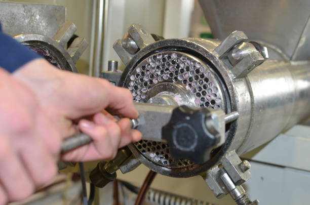 istock hands of apprentices in industrial maintenance at work 1197451246