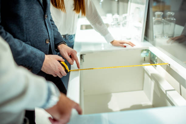 istock Taking measurements of a kitchen element opening for a kitchen appliance 1197452545