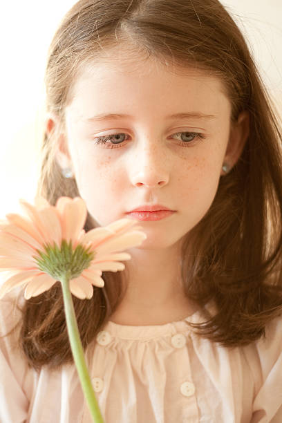 istock Girl with a flower 119745635