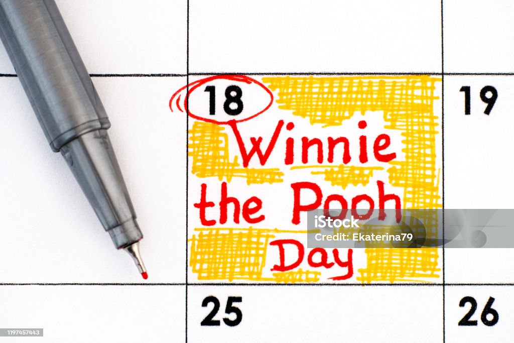 Reminder Winnie the Pooh Day in calendar with pen. Reminder Winnie the Pooh Day in calendar with pen. January 18. Day Stock Photo
