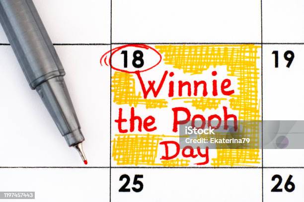 Reminder Winnie The Pooh Day In Calendar With Pen Stock Photo - Download Image Now - Day, Characters, Alphabet