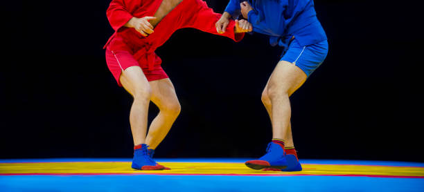 istock Low Section Of Athletes Wrestling 1197459402