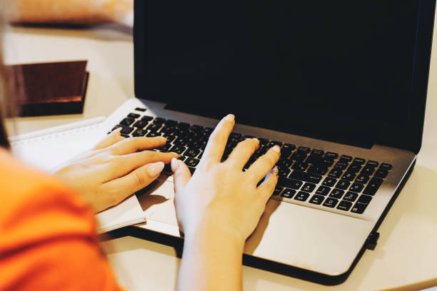istock The girl works at the computer. 1197459598