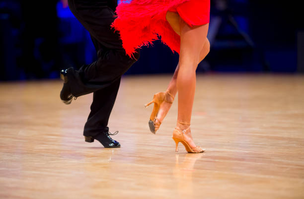 istock Low Section Of Couple Dancing On Floor 1197461089