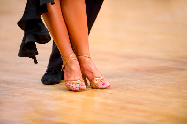 istock Low Section Of Couple Dancing On Floor 1197461484