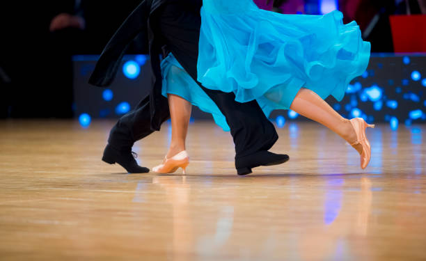 istock Low Section Of Couple Dancing On Floor 1197461487