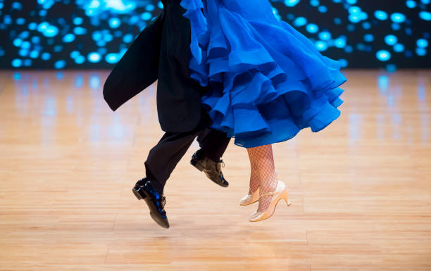 istock Low Section Of Couple Dancing On Floor 1197461504