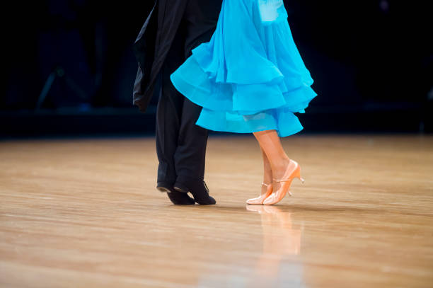 istock Low Section Of Couple Dancing On Floor 1197461879