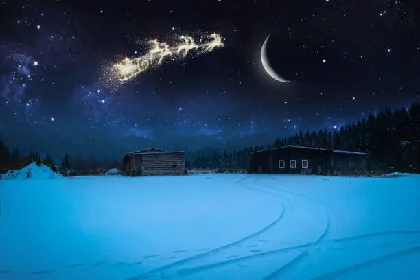 winter landscape at christmas with imaginative starry sky at night