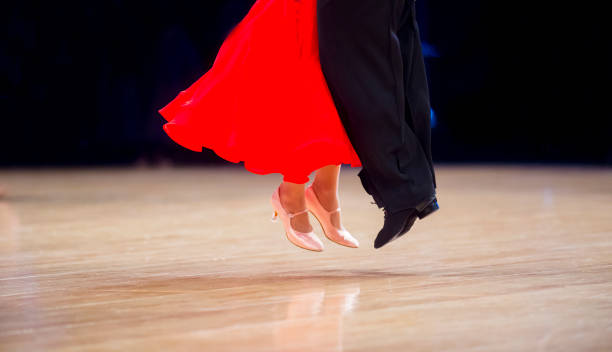istock Low Section Of Couple Dancing On Floor 1197463427
