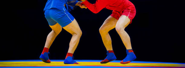 istock Low Section Of Athletes Wrestling 1197465234