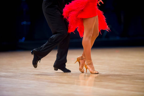 istock Low Section Of Couple Dancing On Floor 1197465271