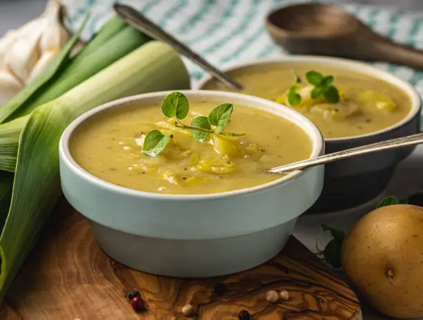 Close up of leek and potato soup in ceramic bowls