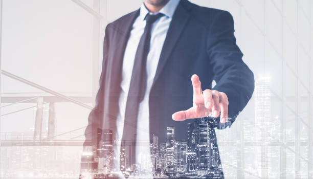 istock Businessman hand touching empty virtual screen, modern business background concept - 1197471485
