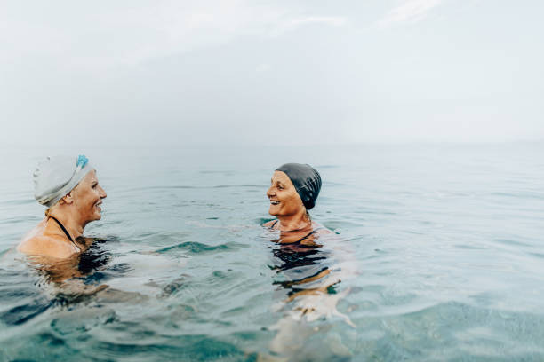 istock Smiling senior women swimmers 1197472352