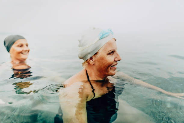 istock Smiling senior women swimmers 1197472353