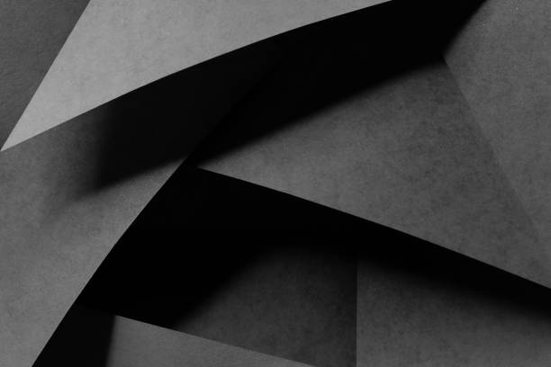 Geometric shapes made paper, dark background