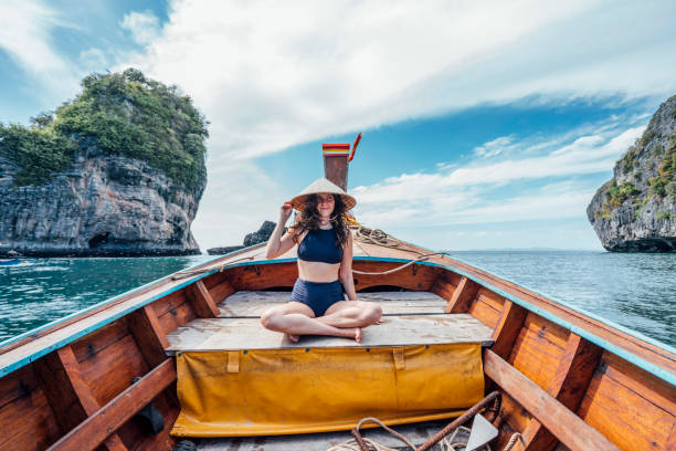 istock Young woman on a longtail boat in Thailand, Phi Phi Island 1197475813