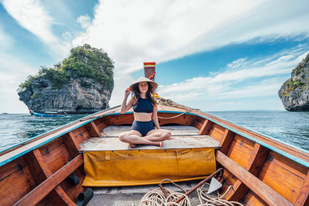 istock Young woman on a longtail boat in Thailand, Phi Phi Island 1197475814
