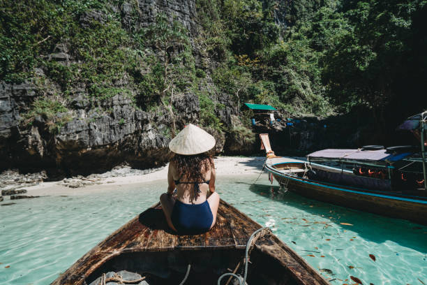 istock Young woman on a longtail boat in Thailand, Phi Phi Island 1197475825