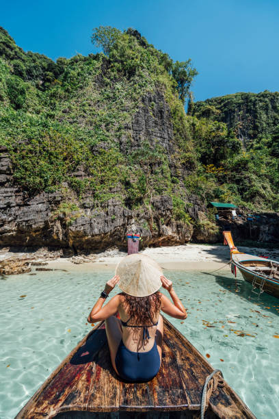 istock Young woman on a longtail boat in Thailand, Phi Phi Island 1197475828