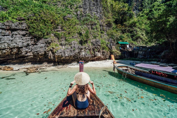 istock Young woman on a longtail boat in Thailand, Phi Phi Island 1197475841