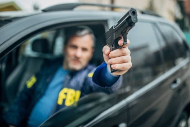 istock An FBI agent uses a gun 1197476938