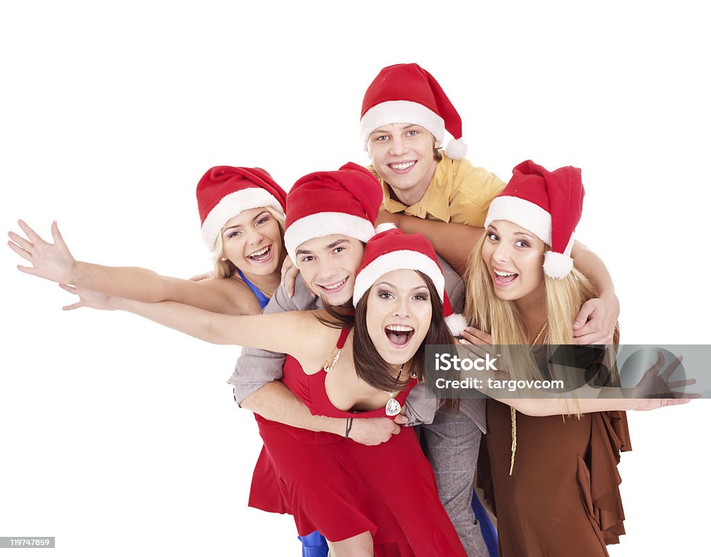 Grupo de jovens no Chapéu de Papai Noel. - Foto de stock de Adolescente royalty-free