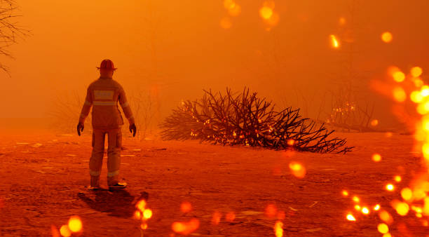 istock Natural disaster hits forest and fire fighter get ready to stop the flames 1197479295