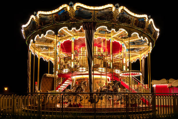 istock Beautiful retro carousel at night 1197483677