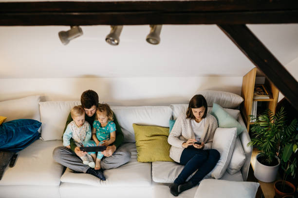 istock Modern family on electronic devices 1197483703