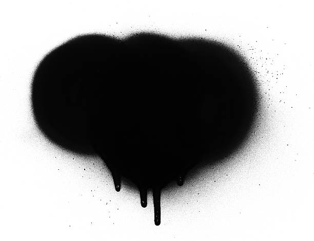 istock White background with spot of dripping black spray paint 119749001