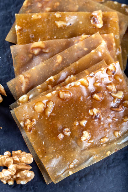 istock Turkish Pestil / Dried Fruit Pulp with Sesame and Walnut 1197492370