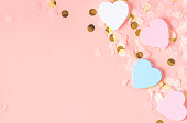 Cute pastel pink background with hearts for Valentine's day, wedding or birthday.