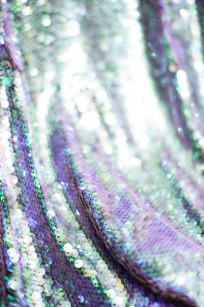 istock Blurred abstract background of holographic sequins. 1197497592
