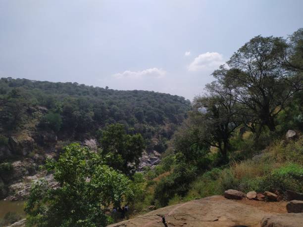 istock Hill station and water in between hills with full greenery and rocks 1197498298