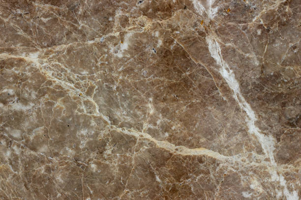 istock White gray brown cracked marble background. 1197498742