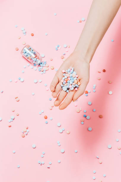istock Hand full of pills 1197503482