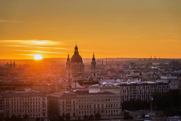 Budapest parlament and Fisherman Bastion in Budapest Hungary. Shot with long exposure at sunrise. Cityscape architecture background.