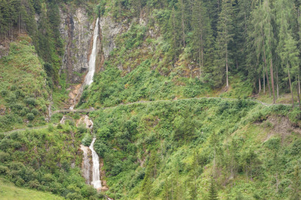 Beautiful waterfall in the mountains of the Alps. Silbertal, Montafon, Vorarlberg